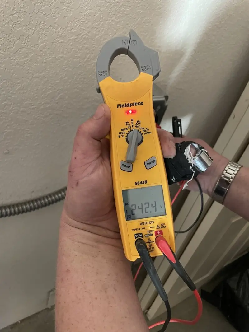 Voltage testing with clamp meter during Recessed Lighting Installation in Hypoluxo
